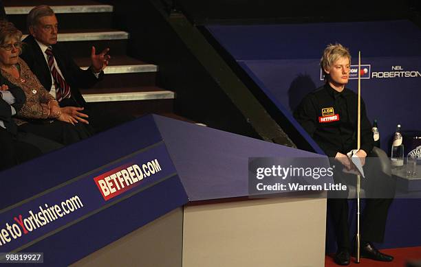 Former cricket umpire, Dickie Bird watches Neil Robertson of Australia in action against Graeme Dott of Scotland during the final of the Betfred.com...