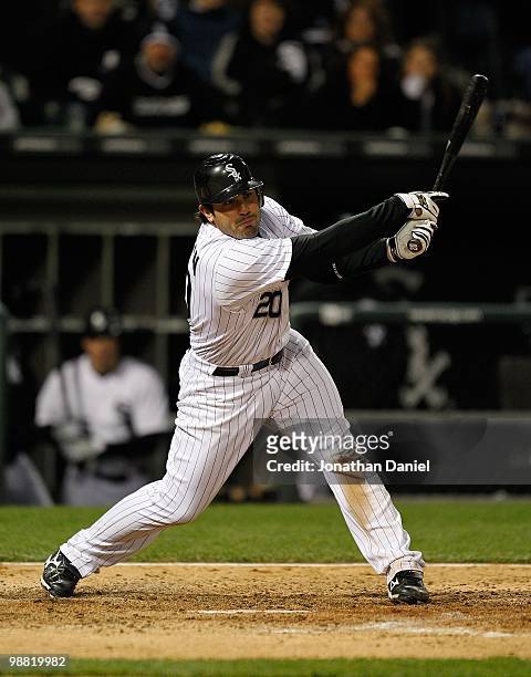 Carlos Quentin of the Chicago White Sox takes a swing against the Tampa Bay Rays at U.S. Cellular Field on April 21, 2010 in Chicago, Illinois. The...