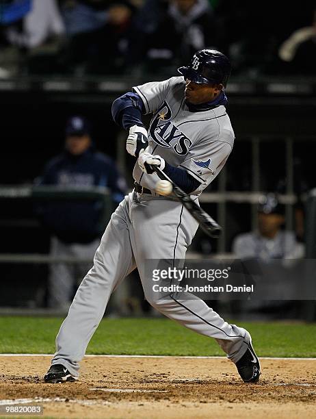 Carl Crawford of the Tampa Bay Rays hits the ball against the Chicago White Sox at U.S. Cellular Field on April 21, 2010 in Chicago, Illinois. The...