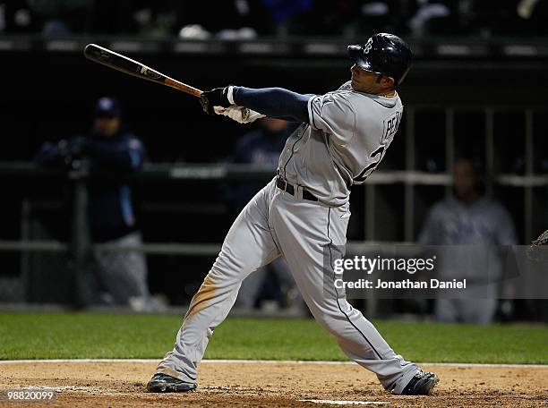 Carlos Pena of the Tampa Bay Rays hits the ball against the Chicago White Sox at U.S. Cellular Field on April 21, 2010 in Chicago, Illinois. The Rays...
