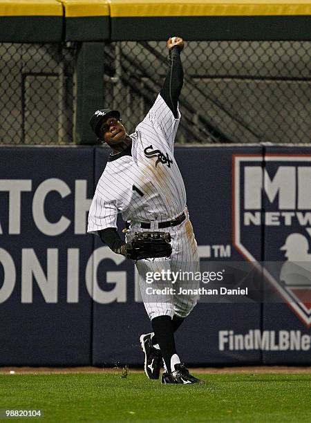 Juan Pierre of the Chicago White Sox throws the ball to the infield against the Tampa Bay Rays at U.S. Cellular Field on April 21, 2010 in Chicago,...