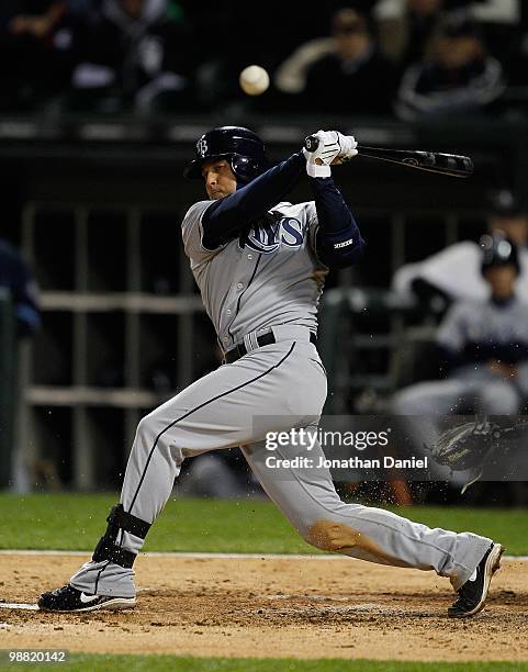 Jason Bartlett of the Tampa Bay Rays fouls off a pitch against the Chicago White Sox at U.S. Cellular Field on April 21, 2010 in Chicago, Illinois....