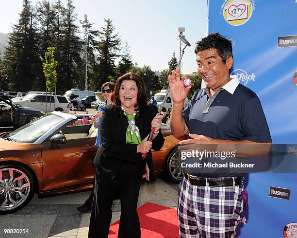 Ann Lopez and comedian George Lopez arrive at the 3rd Annual George Lopez Celebrity Golf Classic at the Lakeside Golf Club on May 3, 2010 in Toluca...