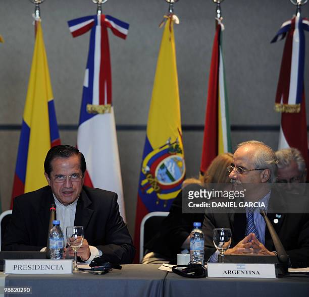 Ecuador's Foreign Minister Ricardo Patino delivers a speech next to Argentine Foreign Minister Jorge Taiana, during the opening session of the Union...