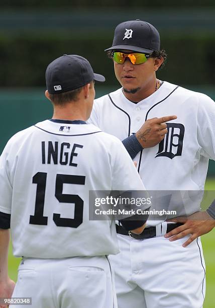 Miguel Cabrera and Brandon Inge of the Detroit Tigers talk together before the game against the Los Angeles Angels of Anaheim at Comerica Park on May...