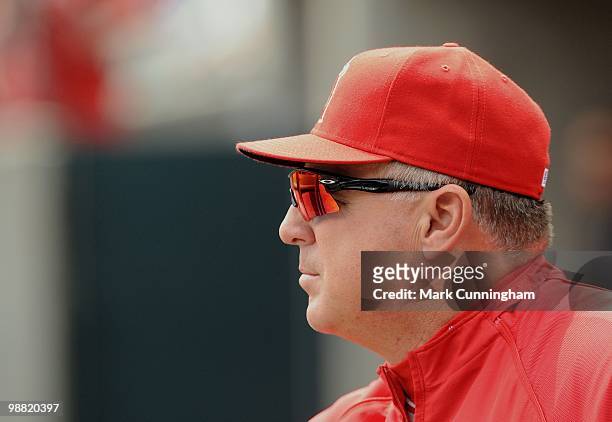 Manager Mike Scioscia of the Los Angeles Angels of Anaheim looks on from the dugout against the Detroit Tigers during the game at Comerica Park on...
