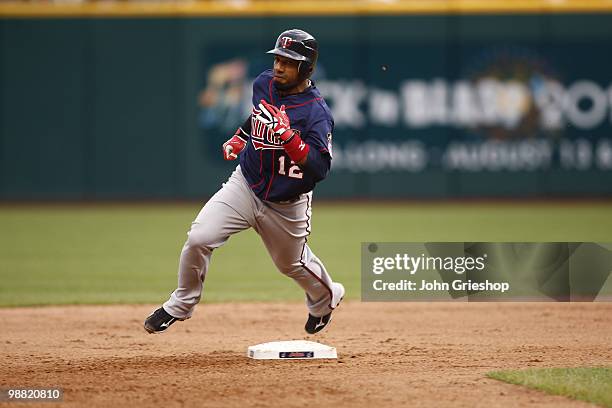 Alexi Casilla of the Minnesota Twins rounds second base during the game between the Minnesota Twins and the Cleveland Indians on Sunday, May 2 at...