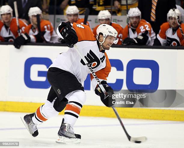 Kimmo Timonen of the Philadelphia Flyers takes the puck in the overtime period against the Boston Bruins in Game One of the Eastern Conference...