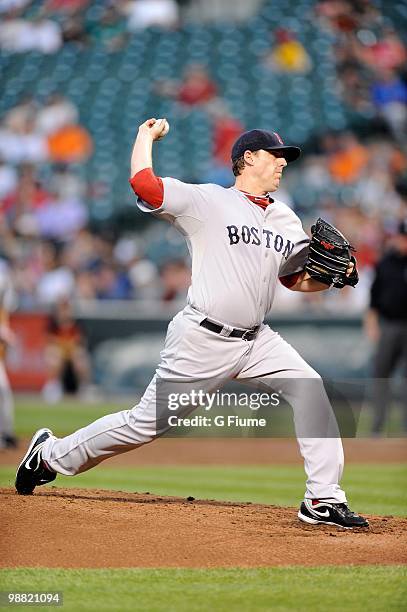 John Lackey of the Boston Red Sox pitches against the Baltimore Orioles at Camden Yards on April 30, 2010 in Baltimore, Maryland.