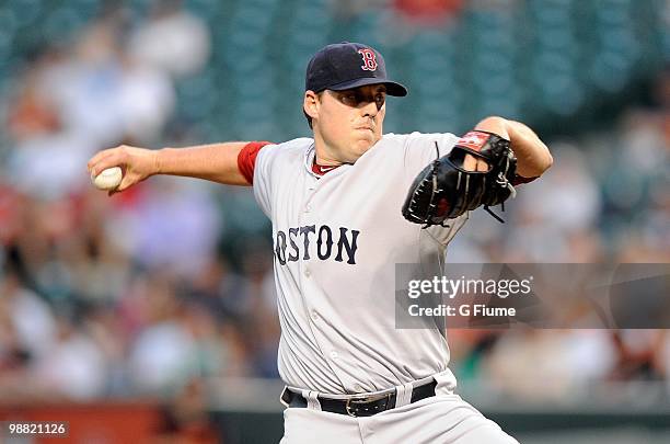 John Lackey of the Boston Red Sox pitches against the Baltimore Orioles at Camden Yards on April 30, 2010 in Baltimore, Maryland.