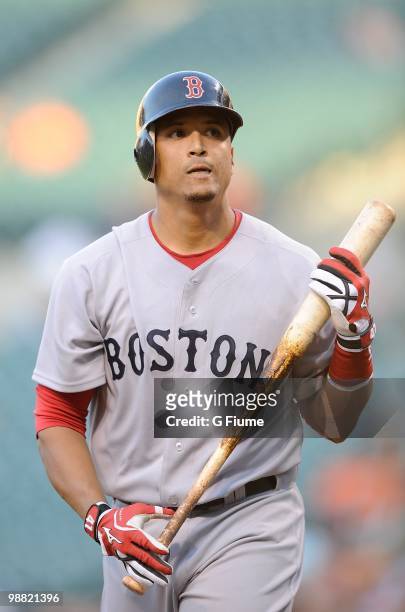 Victor Martinez of the Boston Red Sox walks to the dugout after striking out against the Baltimore Orioles at Camden Yards on April 30, 2010 in...