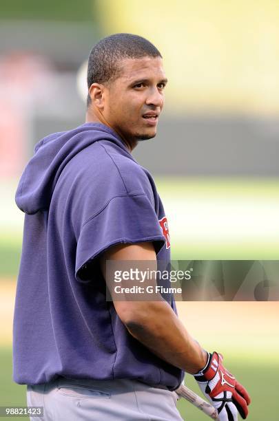 Victor Martinez of the Boston Red Sox warms up before the game against the Baltimore Orioles at Camden Yards on April 30, 2010 in Baltimore, Maryland.