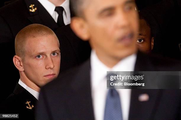 Members of the U.S. Naval Academy football team listen to U.S. President Barack Obama speak during the Commander in Chief trophy presentation in the...