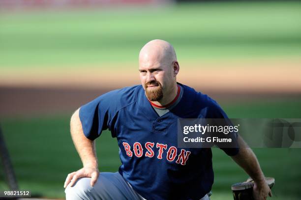 Kevin Youkilis of the Boston Red Sox warms up before the game against the Baltimore Orioles at Camden Yards on April 30, 2010 in Baltimore, Maryland.
