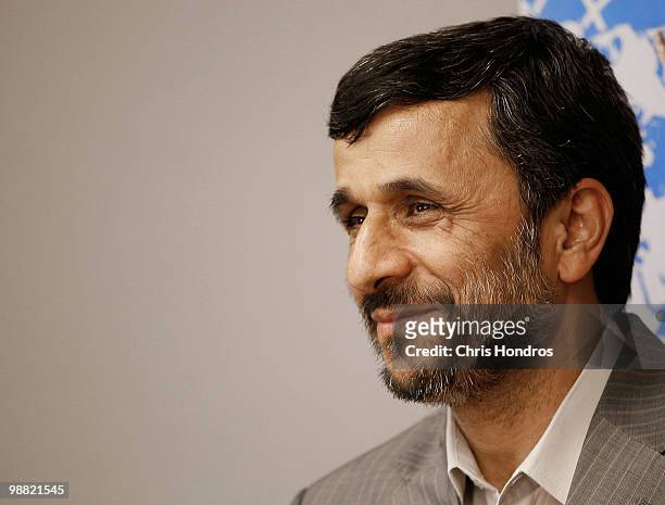 Iranian president Mahmoud Ahmadinejad smiles before a meeting with United Nations Secretary General Ban Ki-Moon during the Nuclear Non- Proliferation...