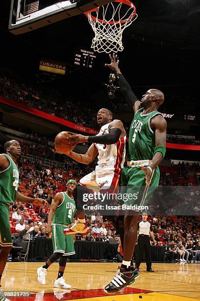 Dwyane Wade of the Miami Heat goes up for a shot against Kevin Garnett of the Boston Celtics in Game Four of the Eastern Conference Quarterfinals...