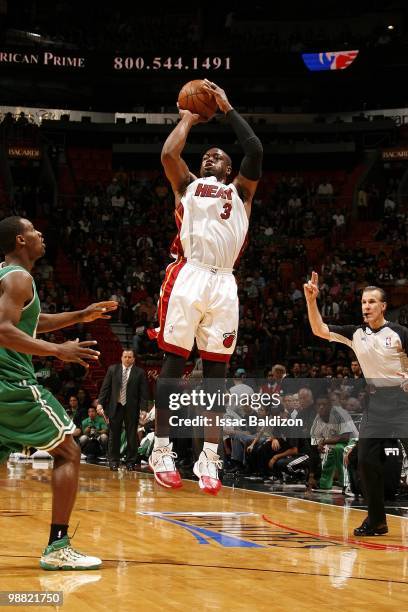 Dwyane Wade of the Miami Heat shoots a jump shot against Tony Allen of the Boston Celtics in Game Four of the Eastern Conference Quarterfinals during...