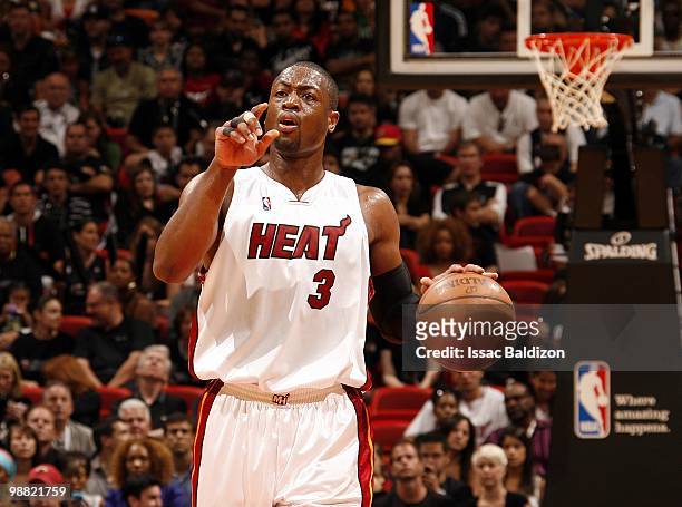 Dwyane Wade of the Miami Heat moves the ball up court in Game Four of the Eastern Conference Quarterfinals against the Boston Celtics during the 2010...