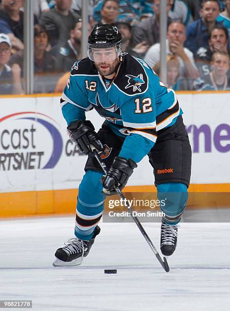 Patrick Marleau of the San Jose Sharks skates up the ice with the puck in Game Two of the Western Conference Semifinals during the 2010 NHL Stanley...