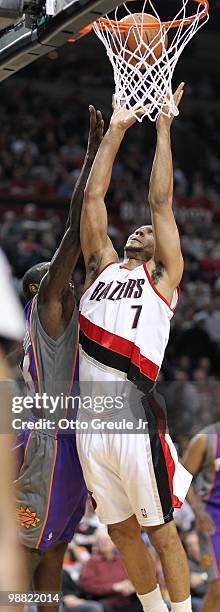 Brandon Roy of the Portland Trail Blazers rebounds against Jason Richardson of the Phoenix Suns during Game Six of the Western Conference...