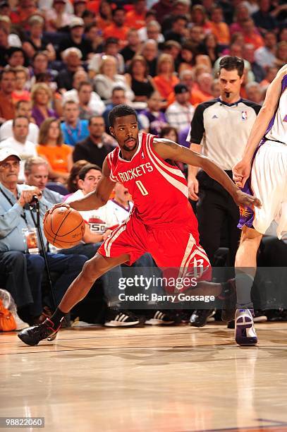 Aaron Brooks of the Houston Rockets drives the ball to the basket against the Phoenix Suns during the game at U.S. Airways Center on April, 2010 in...