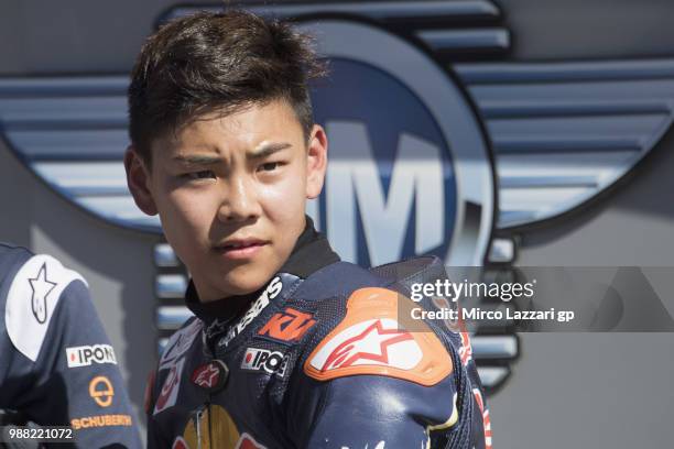 Ryusei Yamanaka of Japan celebrates the third place under the podium at the end of the Red Bull MotoGP Rookies Cup during the MotoGP Netherlands -...