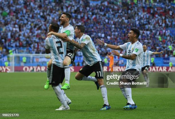 Gabriel Mercado of Argentina celebrates after scoring his team's second goal with team mates Lionel Messi;Angel Di Maria and Cristian Pavon during...