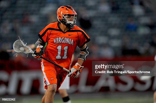 George Huguely Of the Virginia Cavaliers in action against the North Carolina Tar Heels during the Big City Lacrosse Classic at the New Meadowlands...
