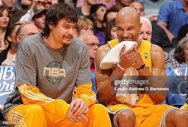 Adam Morrison and Derek Fisher of the Los Angeles Lakers laugh from the bench during the game against the Utah Jazz on April 2, 2010 at Staples...