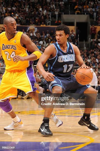 Ronnie Price of the Utah Jazz handles the ball against Kobe Bryant of the Los Angeles Lakers during the game on April 2, 2010 at Staples Center in...