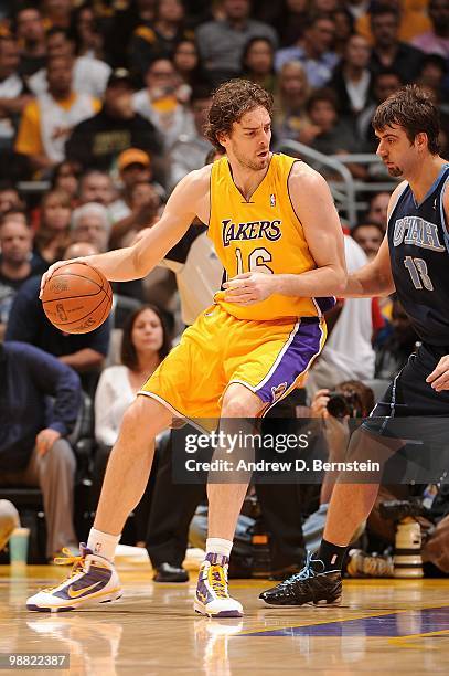 Pau Gasol of the Los Angeles Lakers posts up against Mehmet Okur of the Utah Jazz during the game on April 2, 2010 at Staples Center in Los Angeles,...