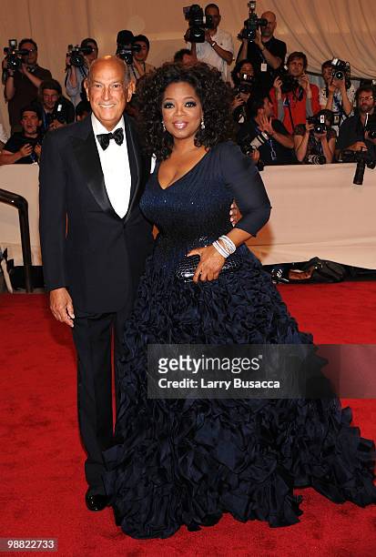 Designer Oscar de la Renta and Oprah Winfrey attend the Costume Institute Gala Benefit to celebrate the opening of the "American Woman: Fashioning a...