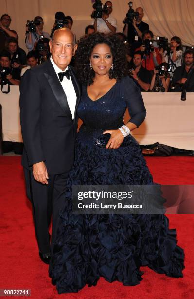 Designer Oscar de la Renta and Oprah Winfrey attend the Costume Institute Gala Benefit to celebrate the opening of the "American Woman: Fashioning a...