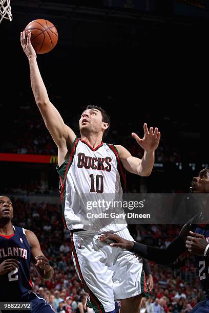 Carlos Delfino of the Milwaukee Bucks lays the ball up in Game Six of the Eastern Conference Quarterfinals against the Atlanta Hawks during the 2010...