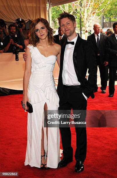 Actress Emma Watson and Burberry Chief Creative Officer Christopher Bailey attend the Costume Institute Gala Benefit to celebrate the opening of the...