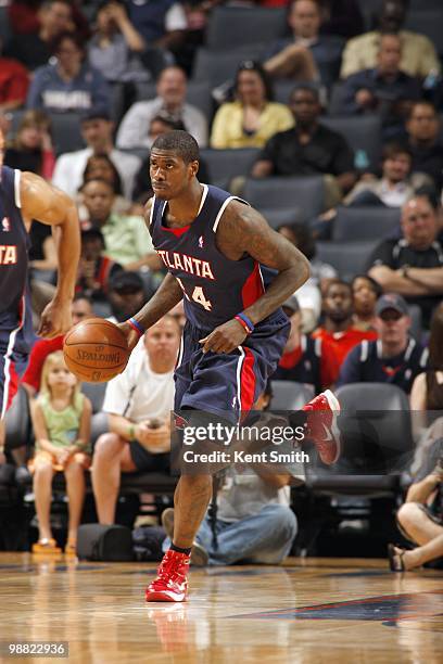 Marvin Williams of the Atlanta Hawks dribbles the ball downcourt against of the Charlotte Bobcats during the game on April 6, 2010 at the Time Warner...