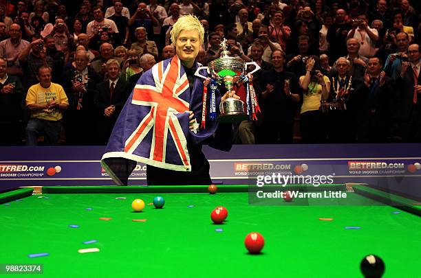 Graeme Dott of Scotland in action against Neil Robertson of Australia during the final of the Betfred.com World Snooker Championships at The Crucible...