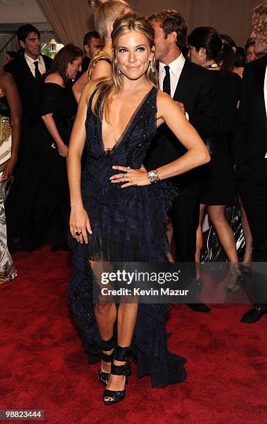 Sienna Miller attends the Costume Institute Gala Benefit to celebrate the opening of the "American Woman: Fashioning a National Identity" exhibition...