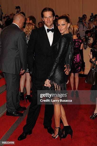 Player Tom Brady and model Gisele Bundchen attend the Costume Institute Gala Benefit to celebrate the opening of the "American Woman: Fashioning a...