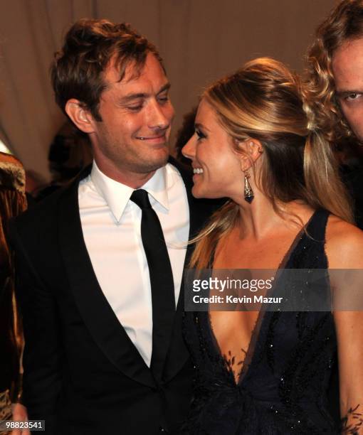 Jude Law and Sienna Miller attends the Costume Institute Gala Benefit to celebrate the opening of the "American Woman: Fashioning a National...