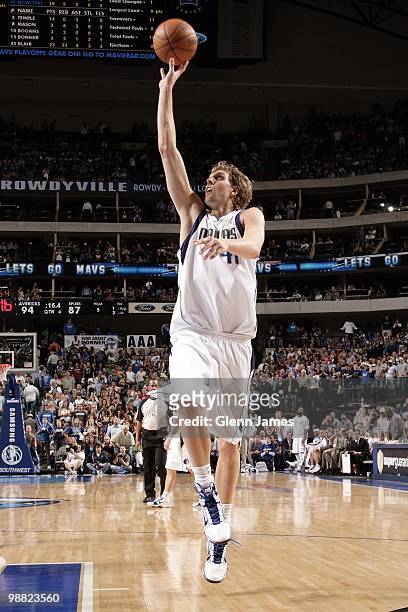 Dirk Nowitzki of the Dallas Mavericks shoots a jumper during the game against the San Antonio Spurs at American Airlines Center on April 14, 2010 in...