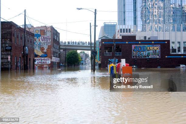 Floodwaters cover downtown streets and sidewalks May 3, 2010 in the Lower Broad district of Nashville, Tennessee. More than 13 inches of rain fell...