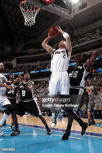 Jason Kidd of the Dallas Mavericks goes up for a shot against DeJuan Blair of the San Antonio Spurs during the game at American Airlines Center on...