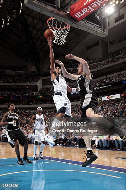 Shawn Marion of the Dallas Mavericks shoots a layup against Matt Bonner of the San Antonio Spurs during the game at American Airlines Center on April...