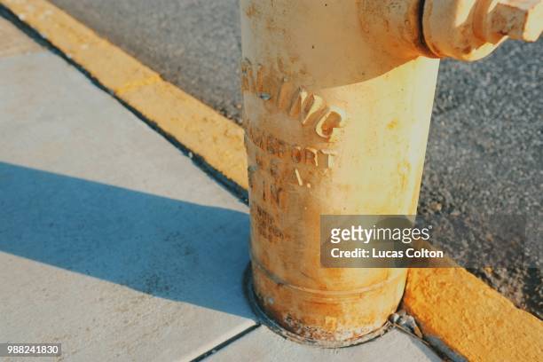 yellow hydrant - colyton stock pictures, royalty-free photos & images