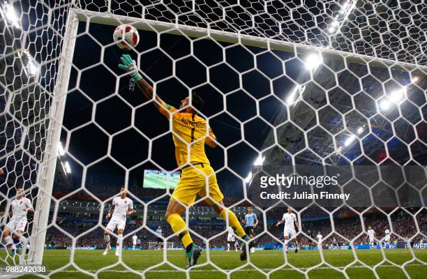 Edinson Cavani of Uruguay scores his team's first goal past Rui Patricio of Portugal during the 2018 FIFA World Cup Russia Round of 16 match between...