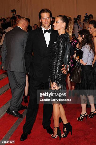 Player Tom Brady and model Gisele Bundchen attend the Costume Institute Gala Benefit to celebrate the opening of the "American Woman: Fashioning a...