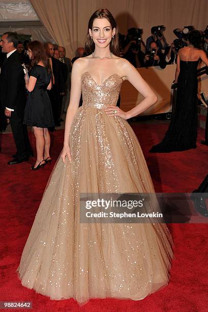 Actress Anne Hathaway attends the Costume Institute Gala Benefit to celebrate the opening of the "American Woman: Fashioning a National Identity"...