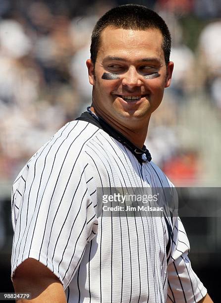 Nick Swisher of the New York Yankees looks on against the Chicago White Sox on May 2, 2010 at Yankee Stadium in the Bronx borough of New York City....