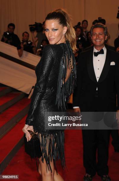 Model Gisele Bundchen attends the Costume Institute Gala Benefit to celebrate the opening of the "American Woman: Fashioning a National Identity"...